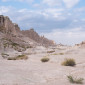 People hiking at Badlands National Park